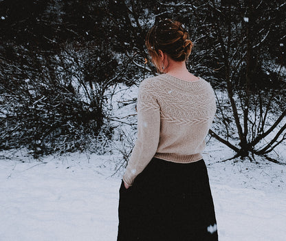 Oksa Sweater | decorative cable pattern in the yoke made from Far by Woolfolk