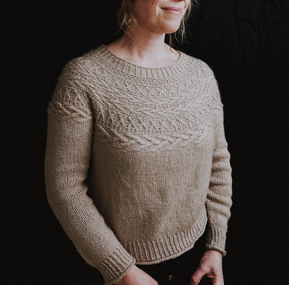 Oksa Sweater | decorative cable pattern in the yoke made from Far by Woolfolk