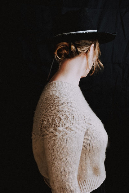 Oksa Sweater | decorative cable pattern in the yoke made from Far by Woolfolk