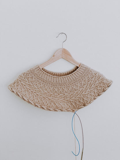 Oksa Sweater | decorative cable pattern in the yoke made from Far by Woolfolk