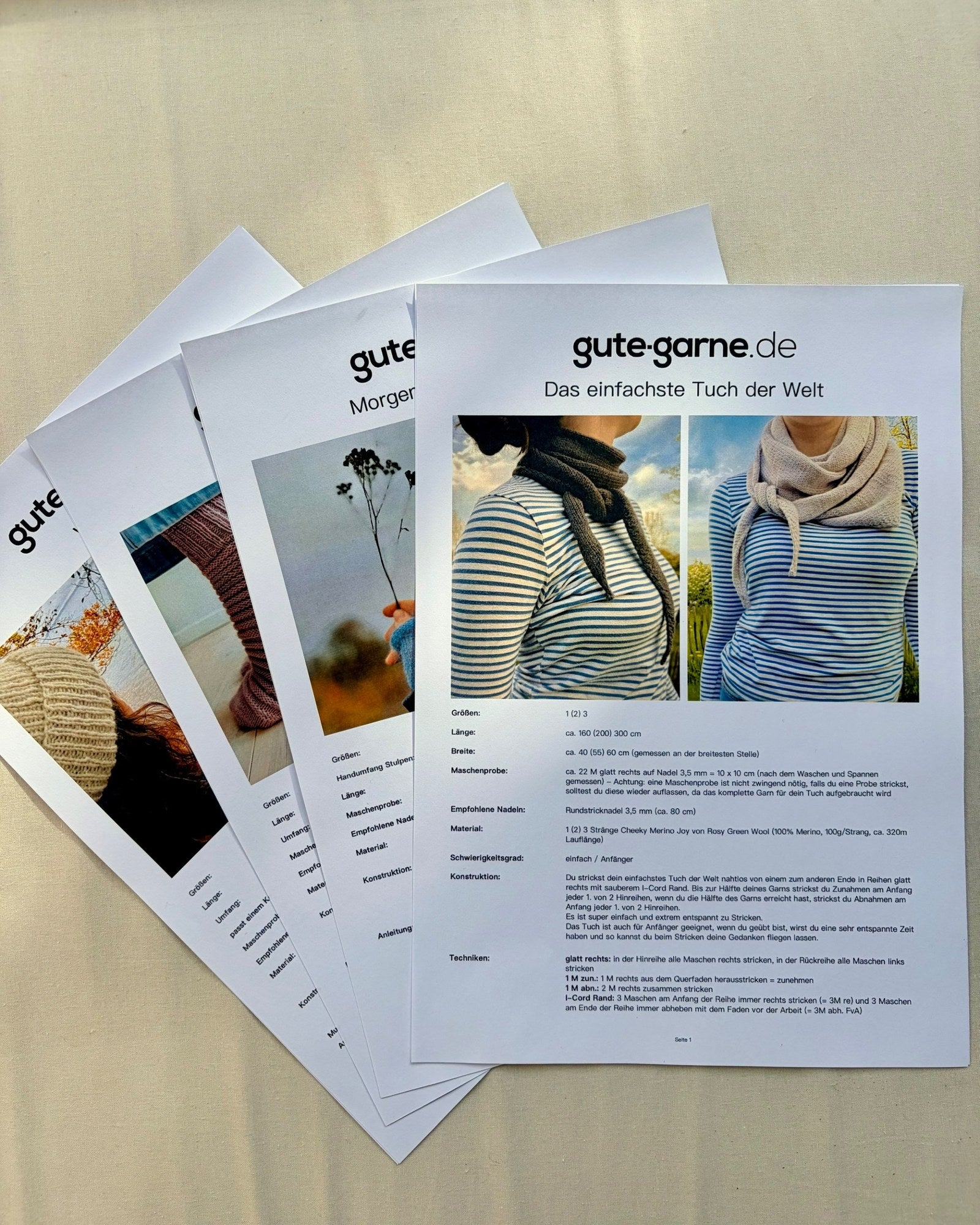 Vier Strickanleitungen von gute-garne.de: Das einfachste Tuch der Welt, Curly Socks, Morgennebel Handstulpen und Wintermütze