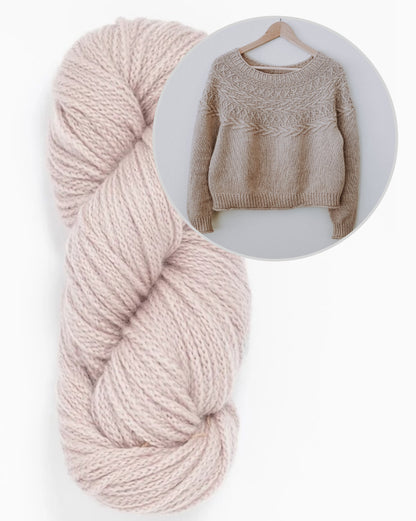 Oksa Sweater | decorative cable pattern in the yoke made from Far by Woolfolk