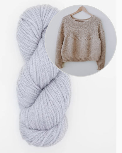 Oksa Sweater | decorative cable pattern in the yoke made from Far by Woolfolk